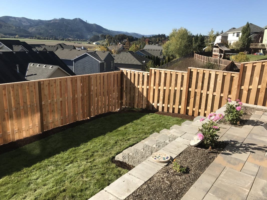 privacy fence on hill